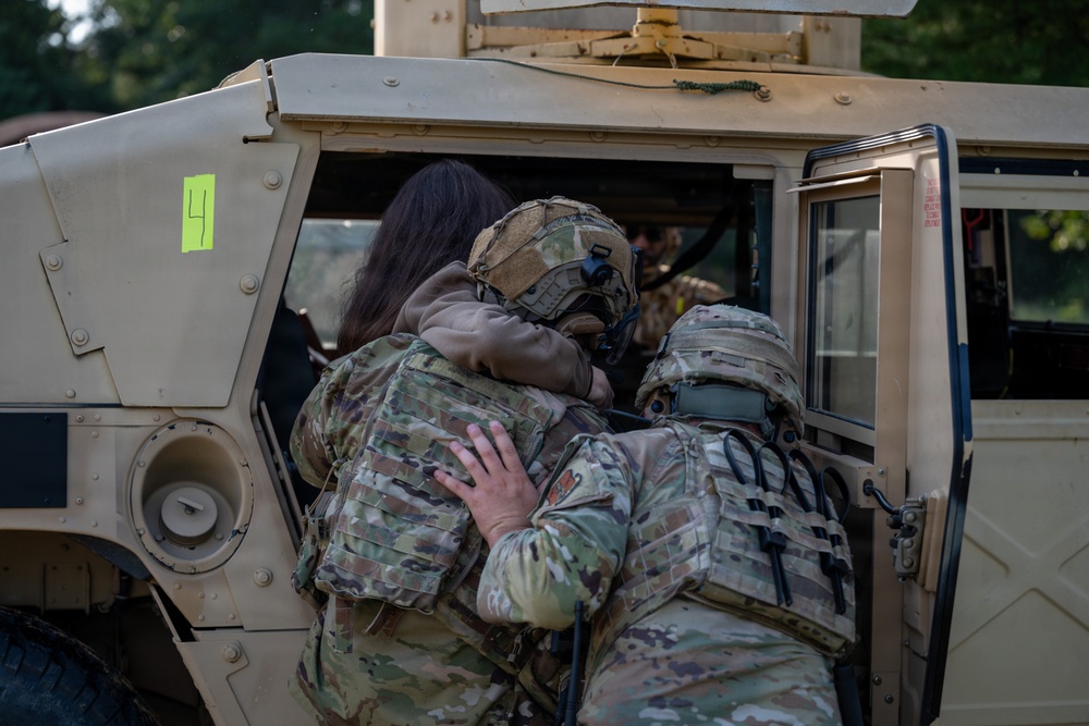 Security forces Airmen deliver life-saving tactical combat casualty care following simulated tornado during Patriot 26