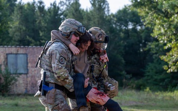 Security forces Airmen deliver life-saving tactical combat casualty care following simulated tornado during Patriot 26
