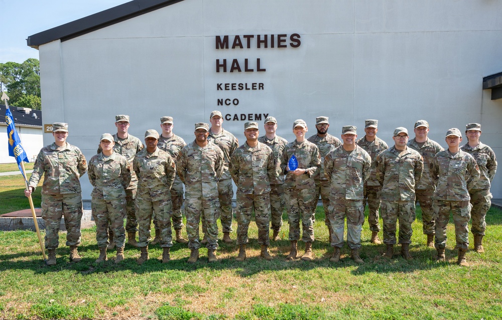81TRW leadership congratulates Mathies NCO Academy personnel for Air Force level award