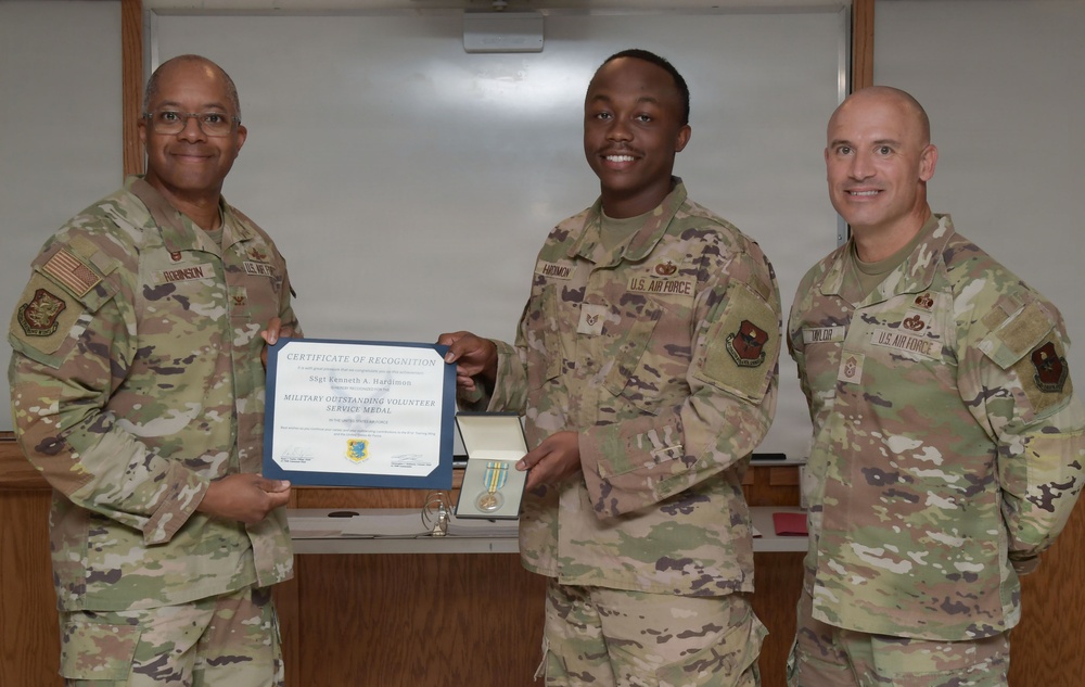 Airmen volunteer presented with Military Outstanding Volunteer Service Medal