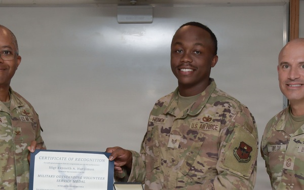Airmen volunteer presented with Military Outstanding Volunteer Service Medal