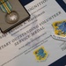 Airmen volunteer presented with Military Outstanding Volunteer Service Medal