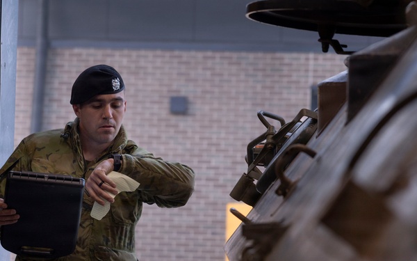 U.S. Marines with 1st LAR participate in tire change event during the Coral-Balmoral Cup
