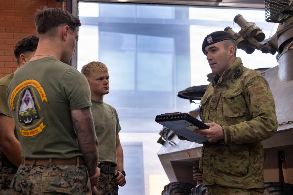 U.S. Marines with 1st LAR participate in tire change event during the Coral-Balmoral Cup