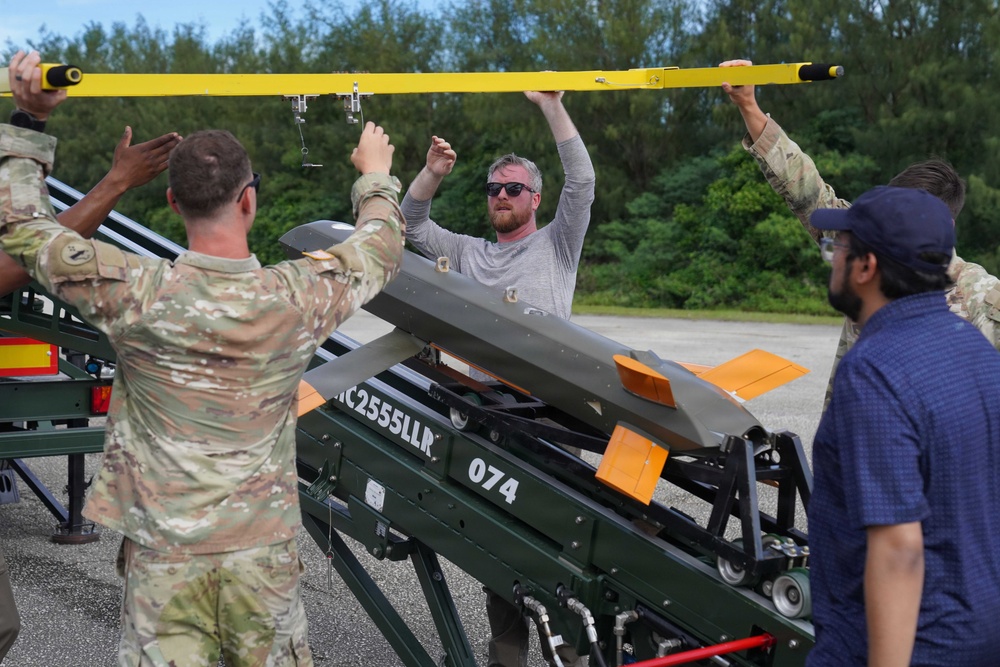 Soldiers load Red Wolf launched effect platform