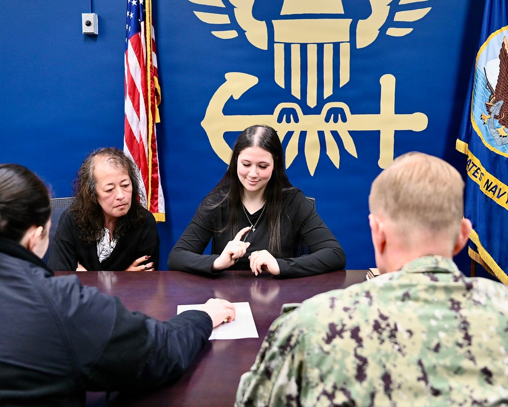 Navy Nurse Commissions Two New Nurses in One Day