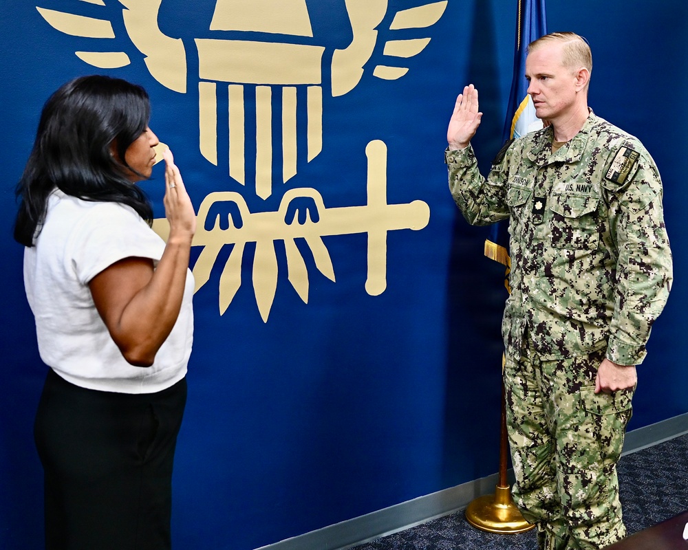 Navy Nurse Commissions Two New Nurses in One Day
