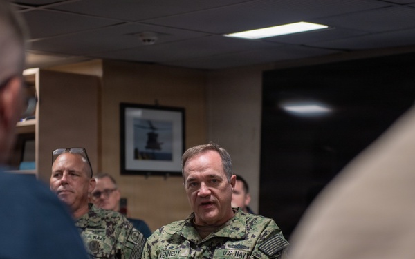 U.S. Navy Rear Adm. Kevin Kennedy visits the San Diego