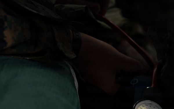 U.S. Marines and Sailors Conduct a Combat Trauma Management Course Evaluation