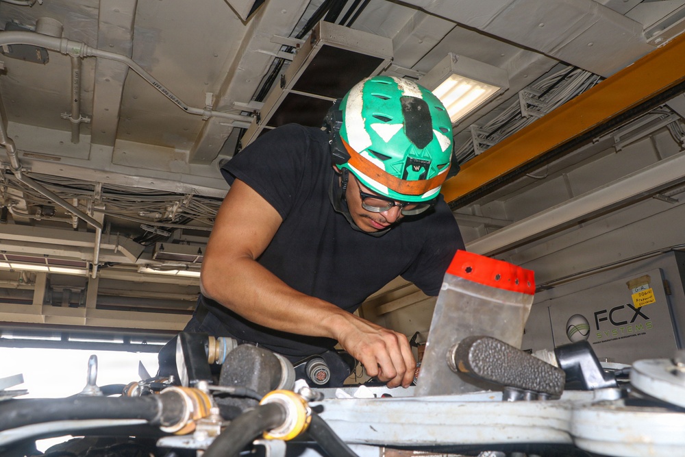 Frank E. Petersen Jr. Sailors Conduct Maintenance