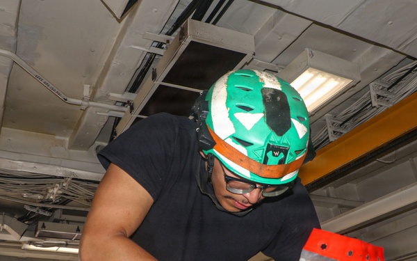 Frank E. Petersen Jr. Sailors Conduct Maintenance