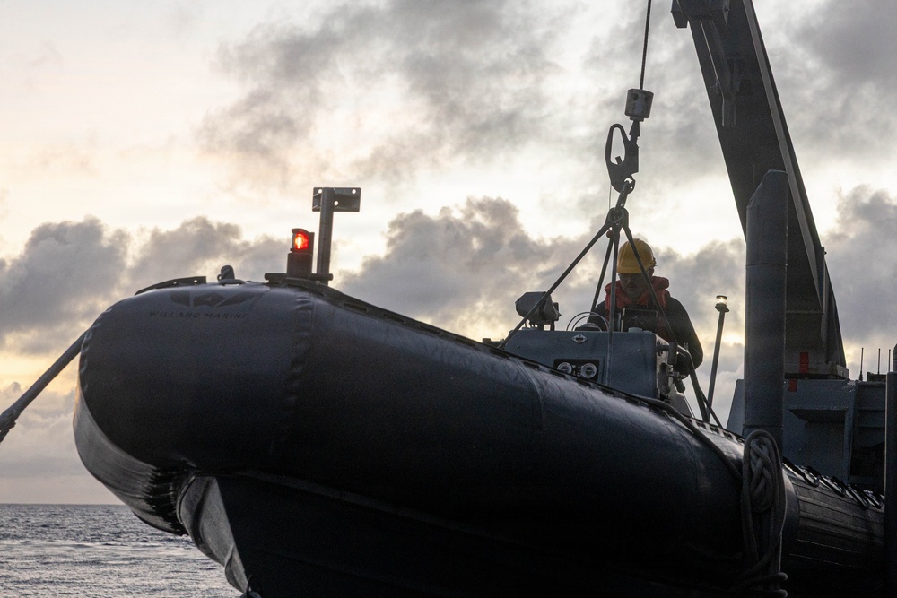 USS Mustin conducts boat operations