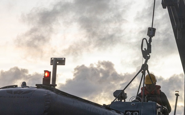 USS Mustin conducts boat operations
