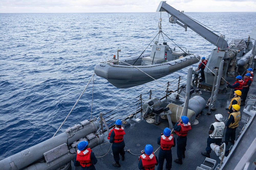 USS Mustin conducts boat operations