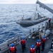 USS Mustin conducts boat operations