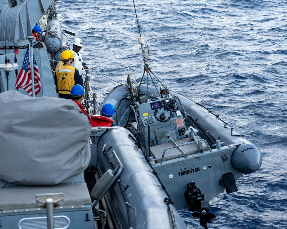 USS Mustin conducts boat operations
