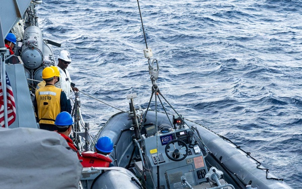 USS Mustin conducts boat operations