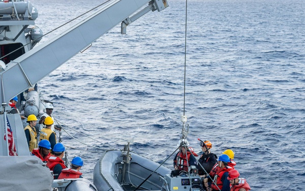 USS Mustin conducts boat operations