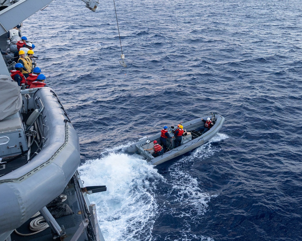 USS Mustin conducts boat operations