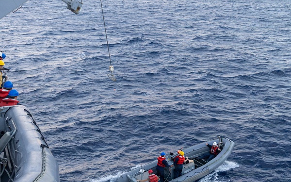 USS Mustin conducts boat operations
