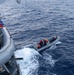 USS Mustin conducts boat operations