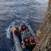 USS Mustin conducts boat operations