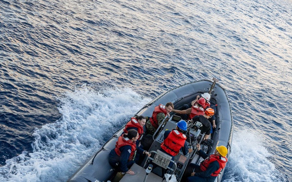 USS Mustin conducts boat operations