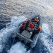 USS Mustin conducts boat operations