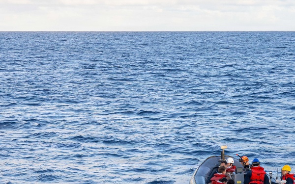 USS Mustin conducts boat operations