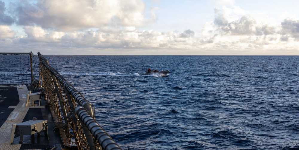USS Mustin conducts boat operations