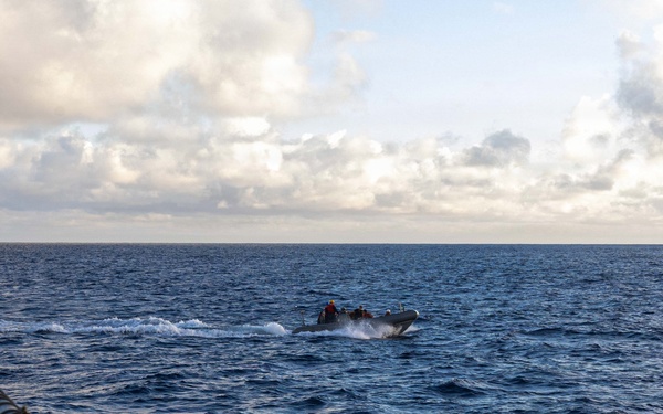 USS Mustin conducts boat operations