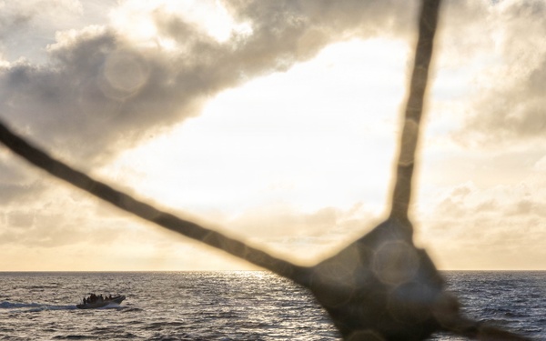 USS Mustin conducts boat operations