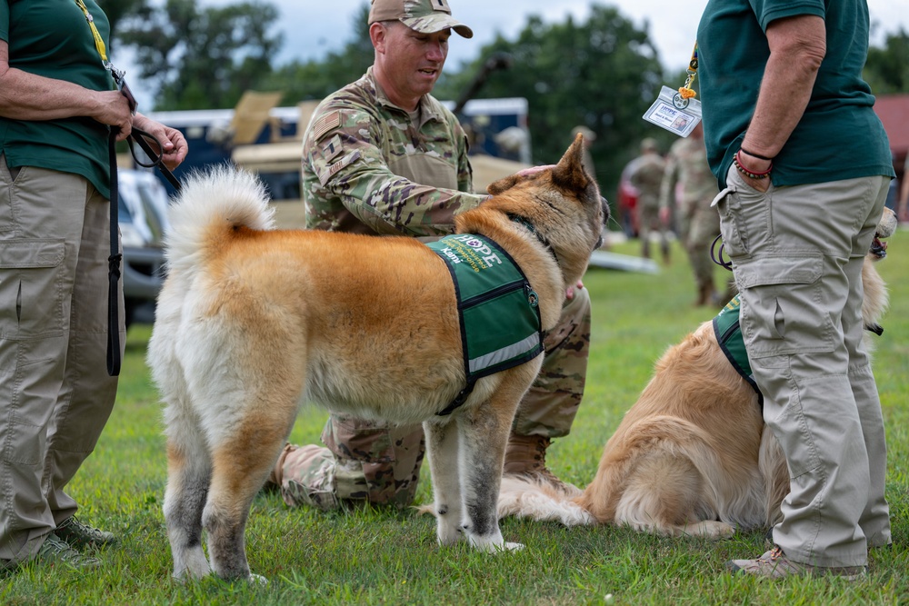 National Guard Soldiers, Airmen partner with therapy canines to boost morale, wellness at Patriot 26