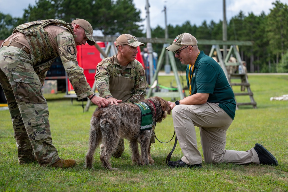 National Guard Soldiers, Airmen partner with therapy canines to boost morale, wellness at Patriot 26