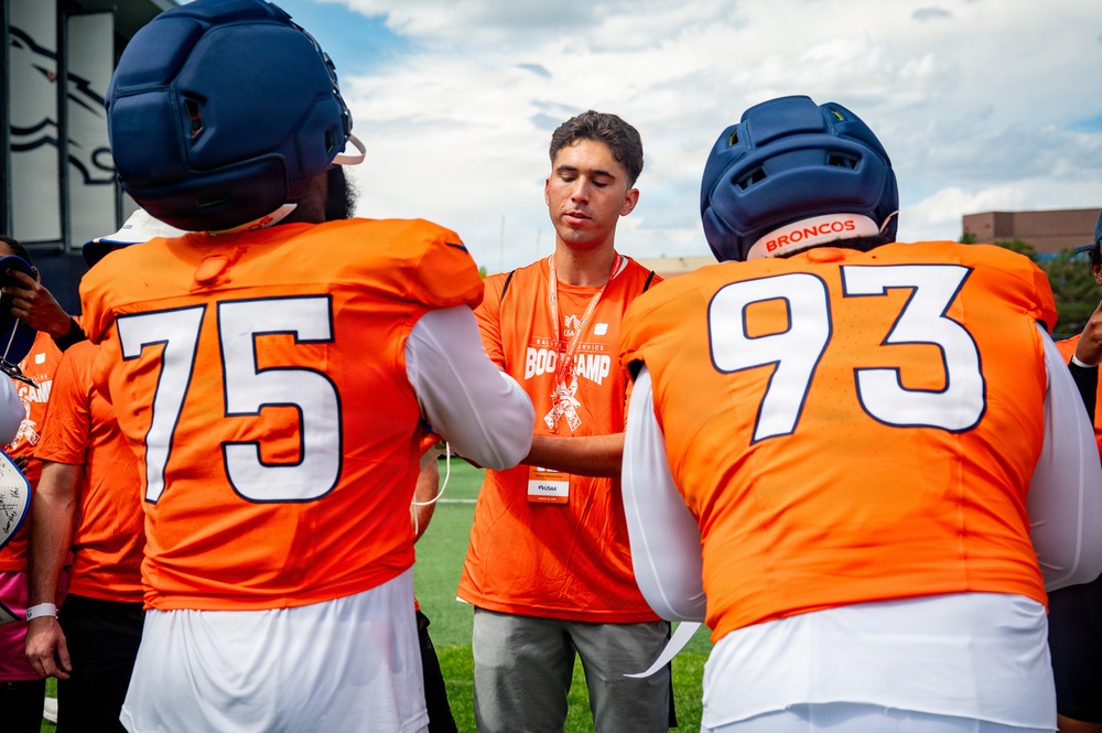 Guardians, Airmen take the field at Denver Broncos Salute to Service Boot Camp