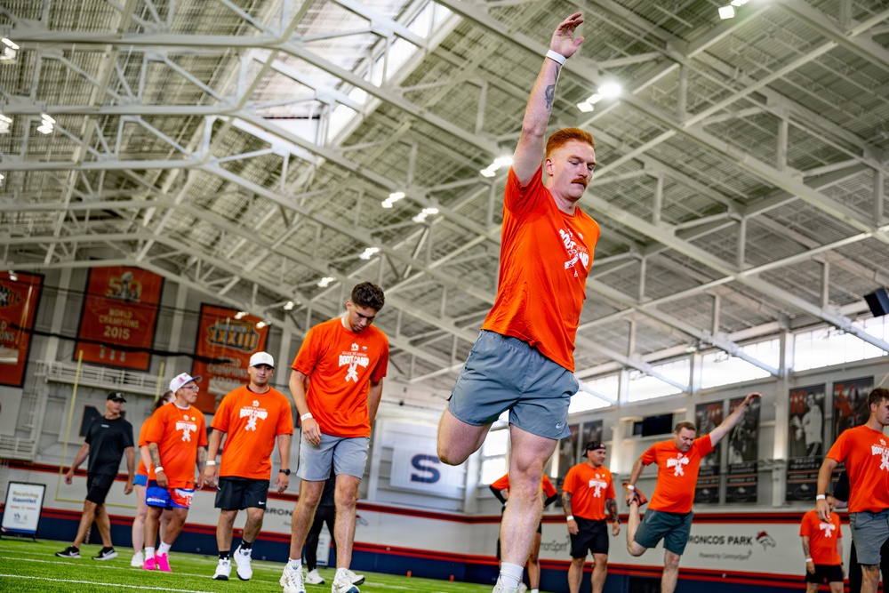 Guardians, Airmen take the field at Denver Broncos Salute to Service Boot Camp