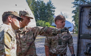 U.S. Soldiers cross train on vehicle recovery techniques with NATO allies in Poland