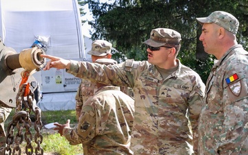 U.S. Soldiers cross train on vehicle recovery techniques with NATO allies in Poland