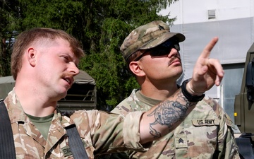 U.S. Soldiers cross train on vehicle recovery techniques with NATO allies in Poland
