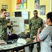NMRTC Pax River Corpsman Demonstrates Tourniquet Application at Homeschool Event