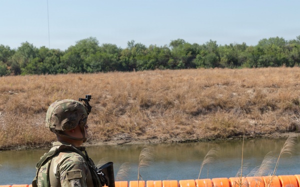 Soldiers conduct security operations in Roma