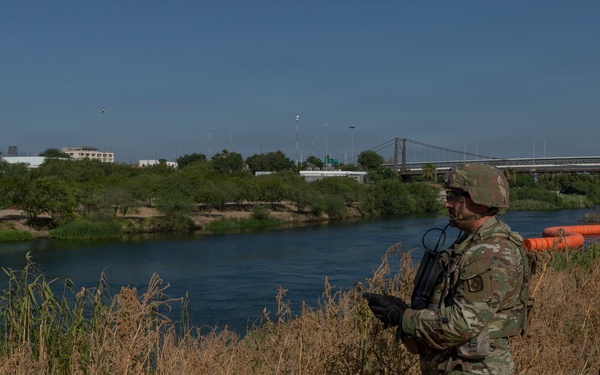 Soldiers conduct security operations in Roma
