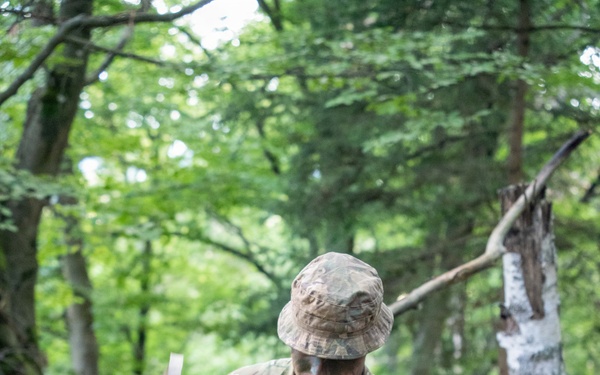 Soldier Prepares to Move at Saber Junction 26