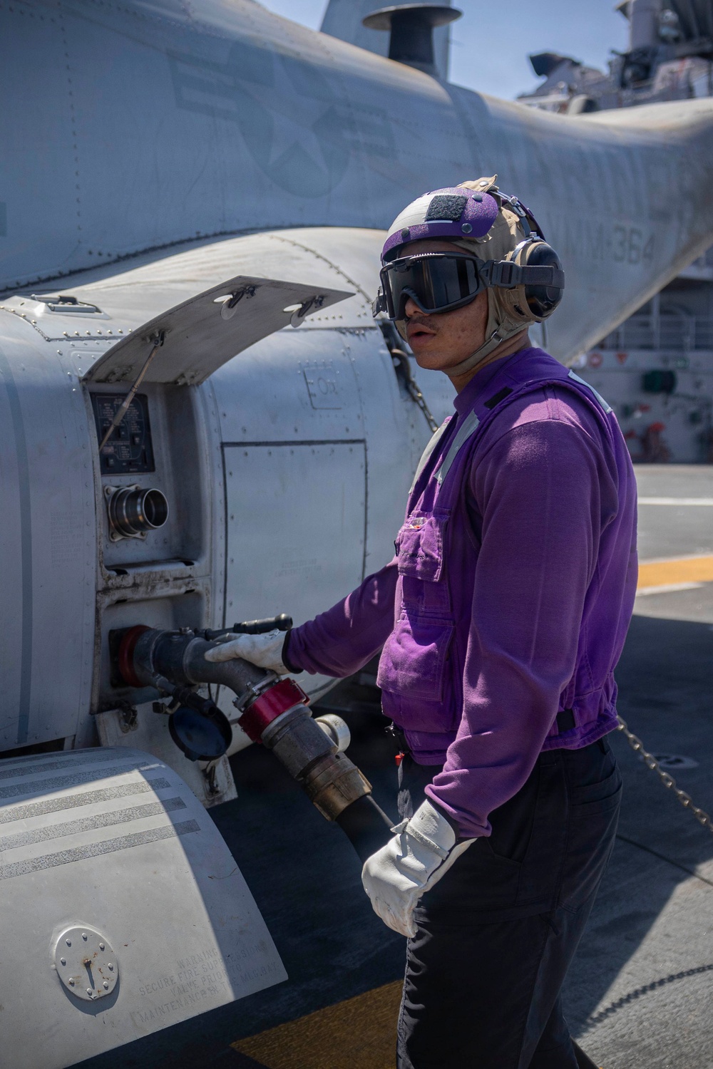 U.S. Navy Sailor Refuels MV-22B Osprey