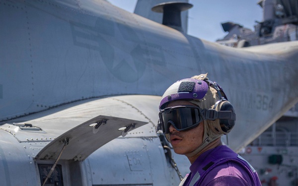 U.S. Navy Sailor Refuels MV-22B Osprey