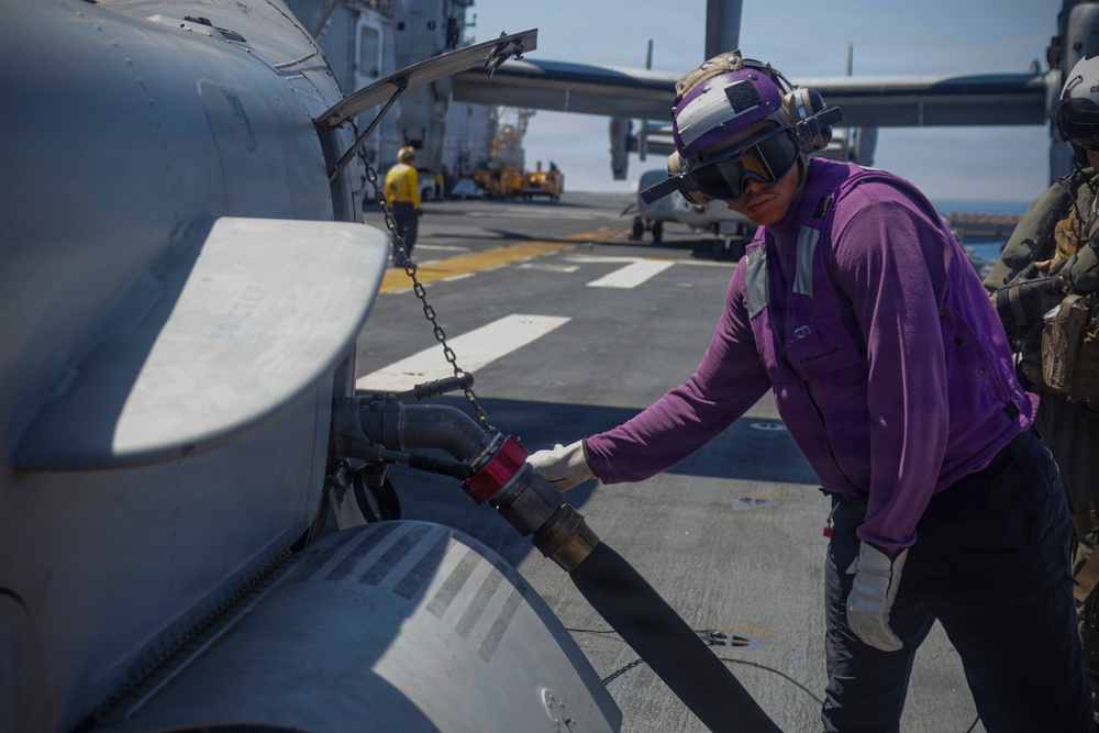 U.S. Navy Sailor Refuels MV-22B Osprey
