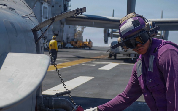 U.S. Navy Sailor Refuels MV-22B Osprey
