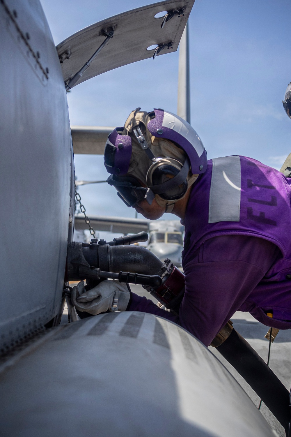 U.S. Navy Sailor Refuels MV-22B Osprey