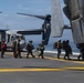 U.S Navy And Marine Corps Personnel Depart USS Makin Island