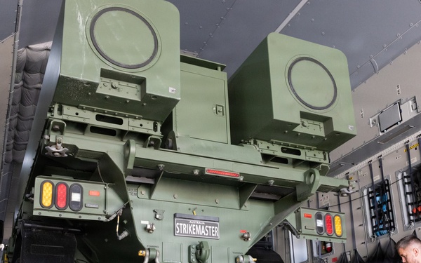 U.S. Marines, U.K. Airmen load Australian Strike Master vehicle onto Airbus A400M Atlas aircraft